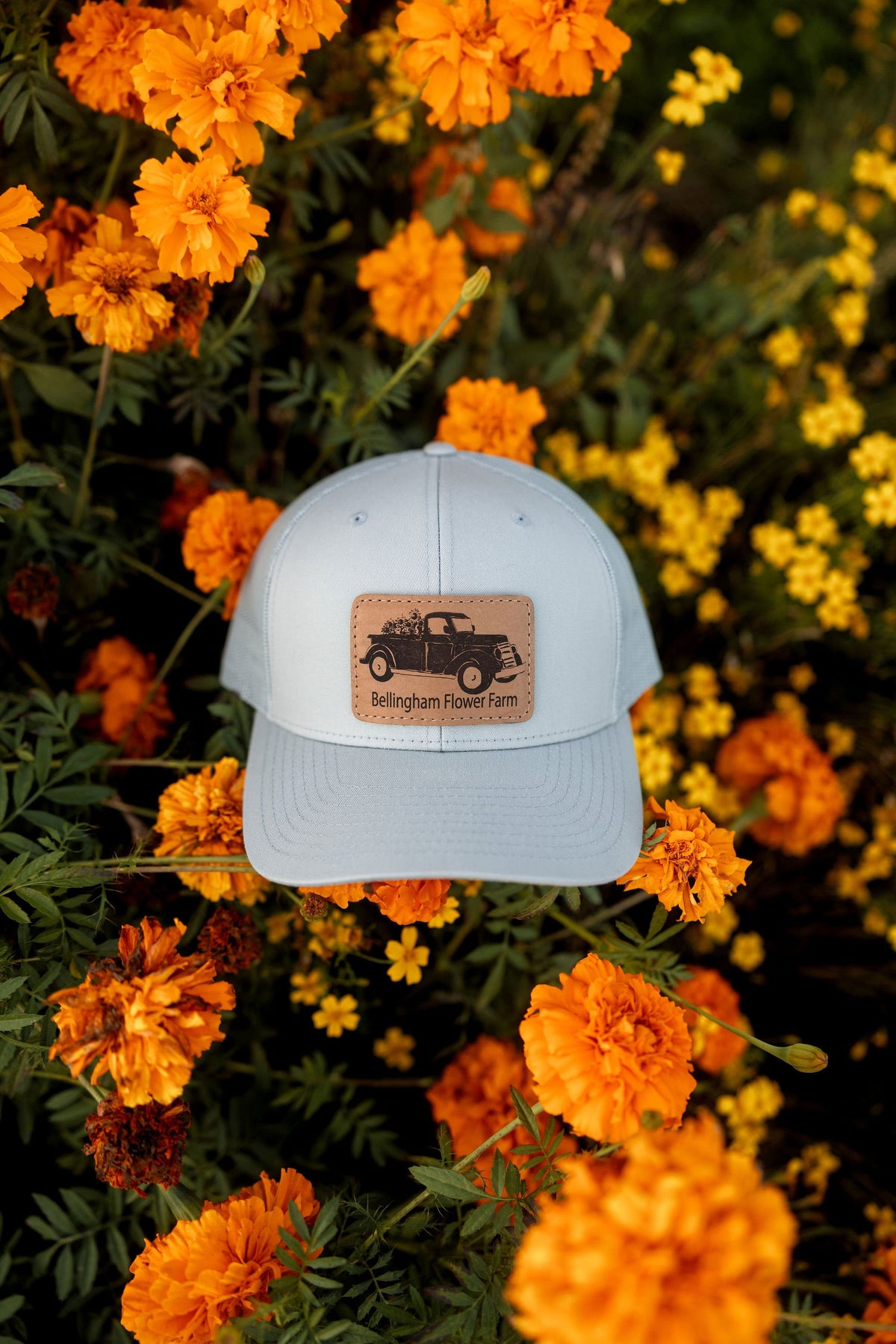 Leather Patch Trucker Hat, Bellingham Flower Farm merchandise, detail view